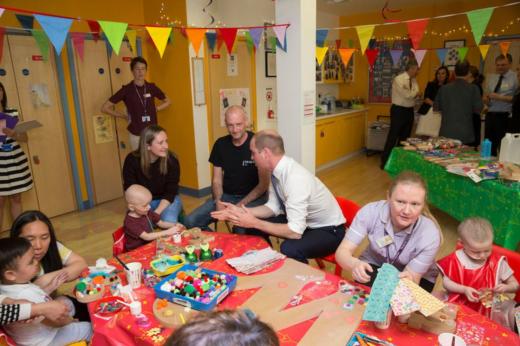 HRH The Duke of Cambridge talks to parents of a patient in one of our play areas