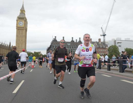 A Royal Marsden runner on the ASICS 10k course in front of Big Ben