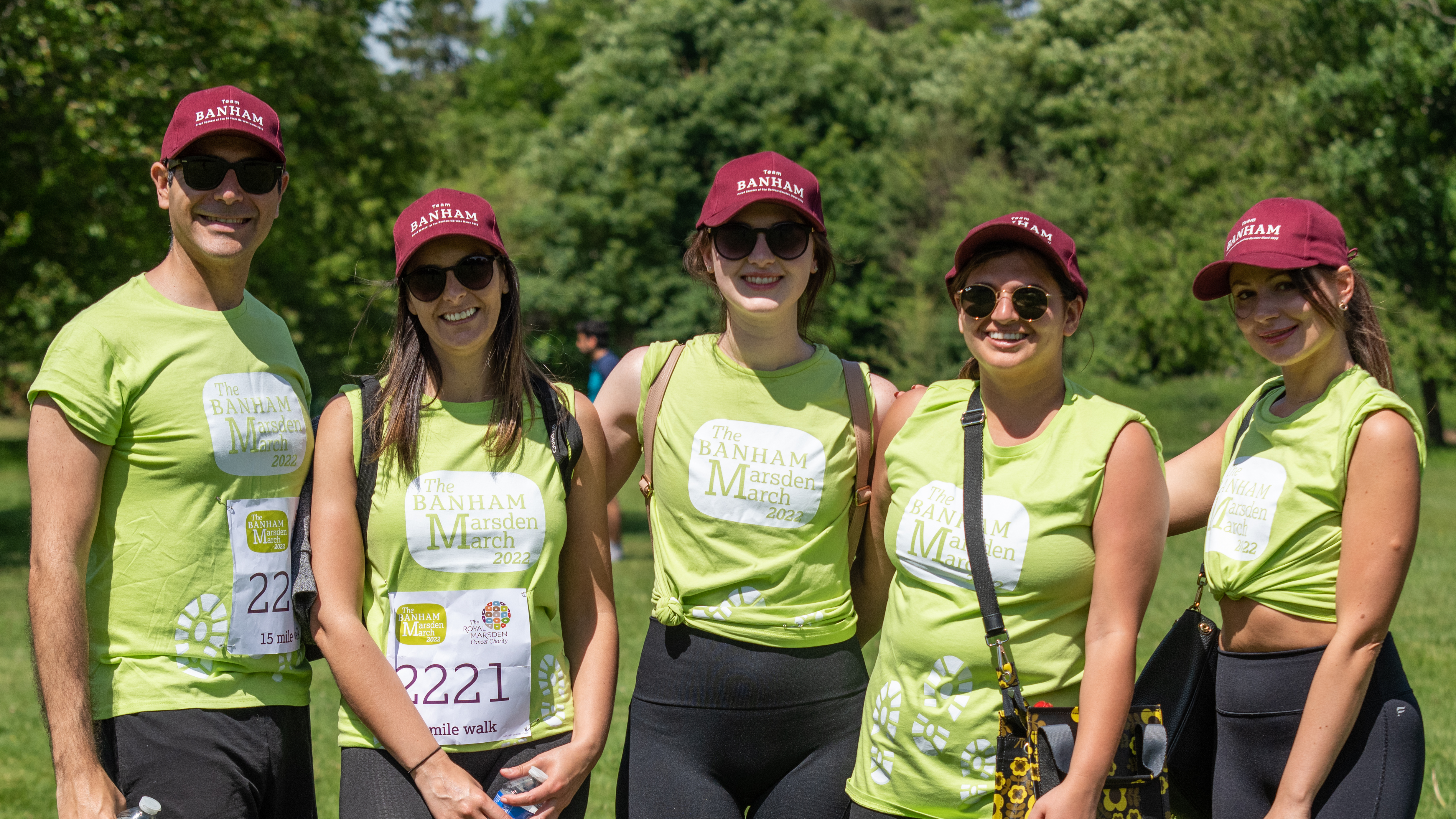 Team Banham at The Banham Marsden March. A group of young people in Banham Marsden March green t-shirts and caps