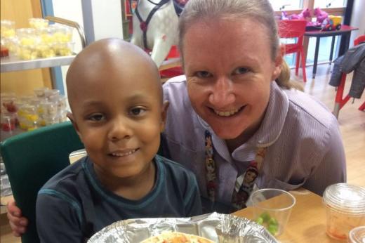 Play specialist Claire Riddell with a young patient at one of the children's parties