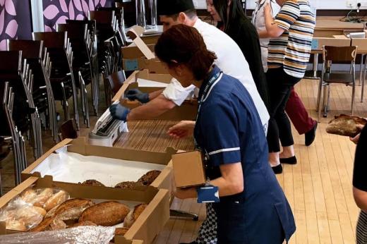 staff receiving bread