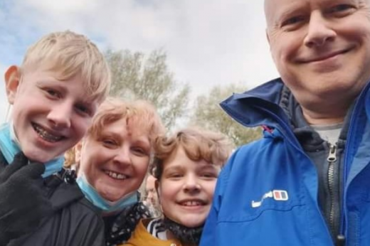A selfie of Ryan and his family smiling