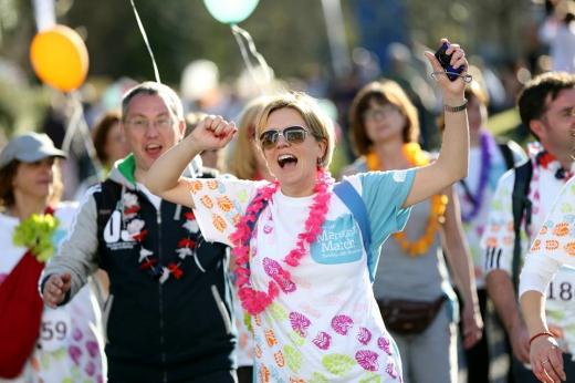 Laura Parker crossing the finish line at the Banham Marsden March