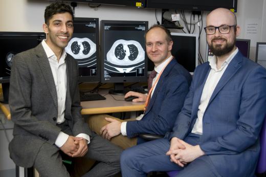 Dr Sumeet Hindocha, Dr Richard Lee and Dr Benjamin Hunter looking at scans on a computer