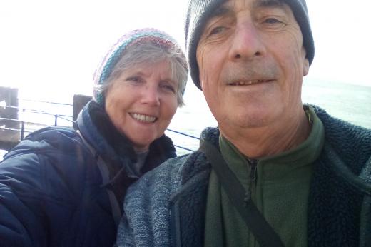 Selfie of Andy Johnstone with his wife Tricia outside wearing winter hats and coats