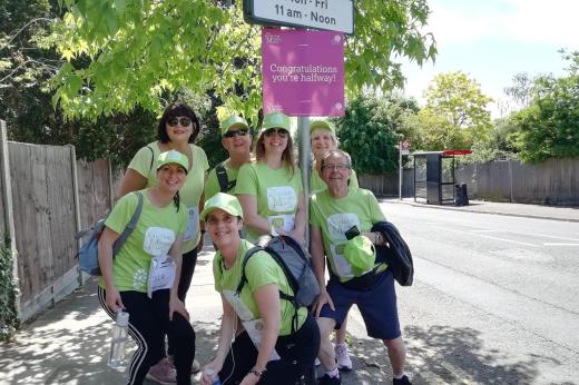 Team of Marsden Marcher's with the halfway sign