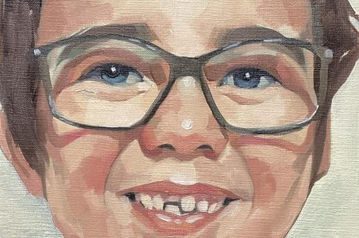 A detailed painting of a child's face wearing glasses and missing a front tooth