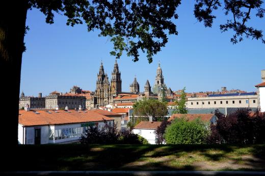 View of the Catedral de Santiago de Compostela across rooftops of the town