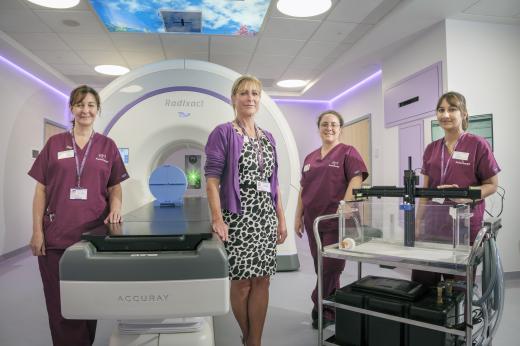 The Radixact linear acceleration (Linac) with staff from The Royal Marsden