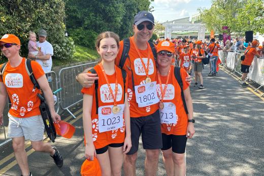 Sally at the BMM finish line in 2024 with her husband and daughter