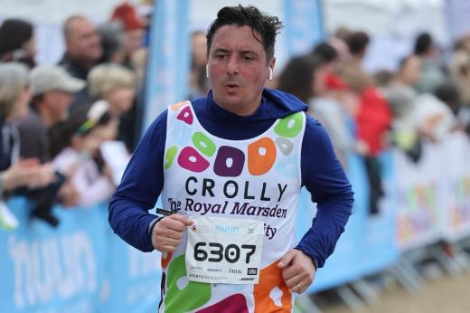 RMCC runner concentrating while he's crossing the finish line