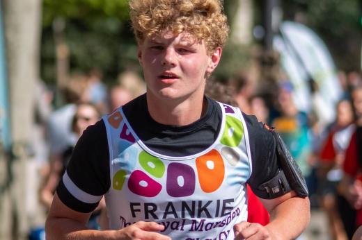 RMCC runner up close shot of him running and concentrating in the sun