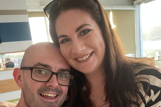Tash smiling with her husband