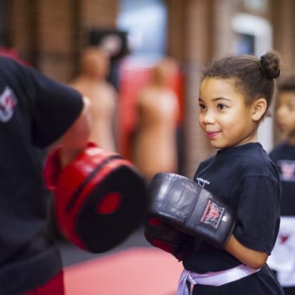 Students at the Phoenix School of Martial Arts being put through their paces