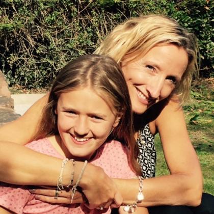 Chloe hugging her daughter