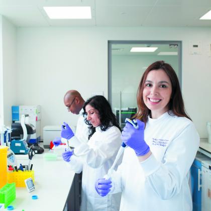 Cancer researchers working in the lab