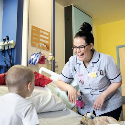 Staff Nurse Nadia Freri with a young patient