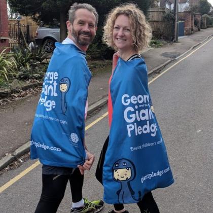 Vicky and Woody in George and the giant pledge capes