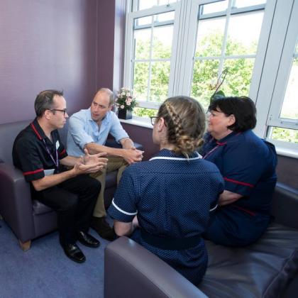 Staff who received psychological support meet with The Duke