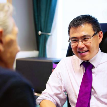 Ian Chau with patient