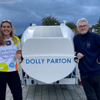 Charlotte Irving and her dad Colm Irving with the boat named Dolly Parton