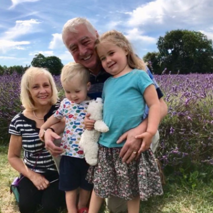 Christine Lockton and her husband Keith with their grandchildren