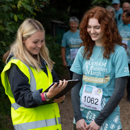 The Banham Marsden March walker with a volunteer