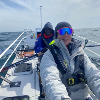 Two members of team Sea Legs in their boat