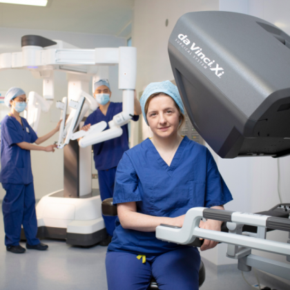 Robotic surgeons in Blue Royal Marsden scrubs with the Da Vinci Xi cancer surgery robot