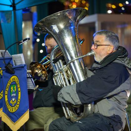 Two members of the band playing brass instruments at the Sutton Celebrate a life service