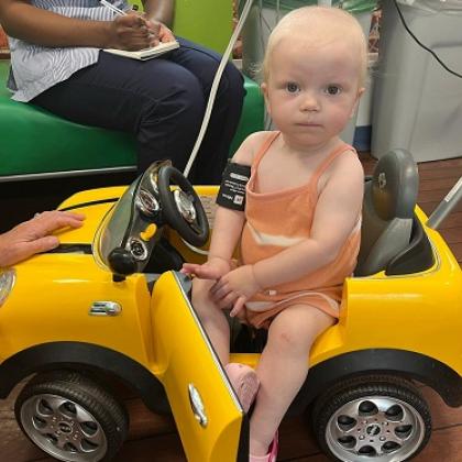 Lola in toy car