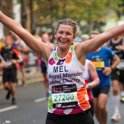A Team Marsden runner smiles at the camera.