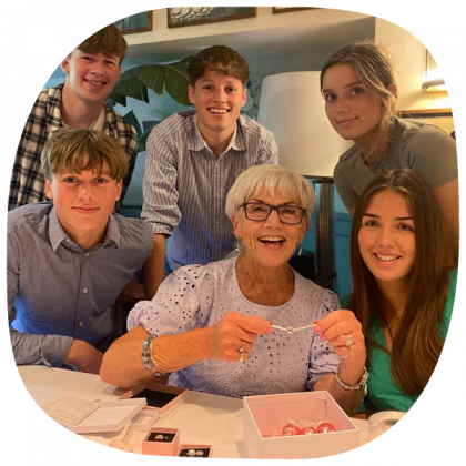 Jacky Phillips celebrating with her grandchildren