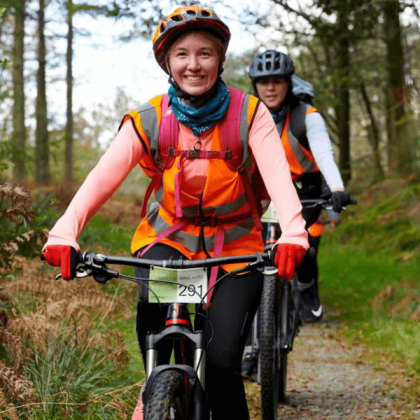 Two cyclists taking on the Lake District Triple Challenge