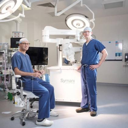 Kieran Power, Head of Plastic Surgery, and Aadil Khan, Consultant Plastic Surgeon with the new Symani Surgical System for microsurgery procedures at The Royal Marsden