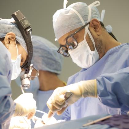 Dr Vinidh Paleri in surgery at The Royal Marsden