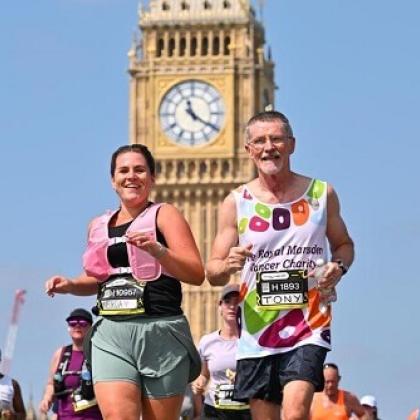 RMCC runner with his daughter in the sun with Big Ben in the background