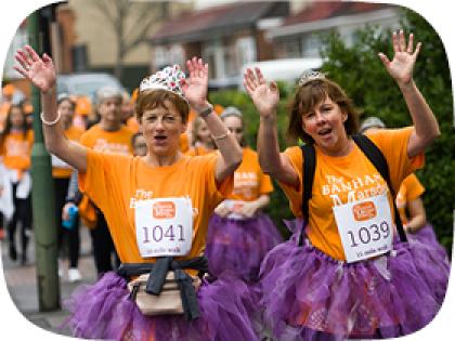 Catherine wearing a purple tutu on The Banham Marsden March fundraising walk for The Royal Marsden