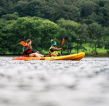 Two kayakers on a lake