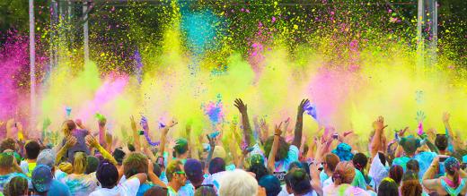 Colours thrown in the air over a crowd