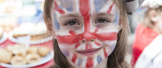 Girl with union jack painted on her face