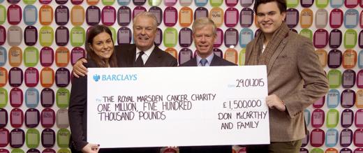 Don McCarthy and family present giant cheque to Ian Molson