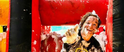 Woman on an obstacle at The Gauntlet Games