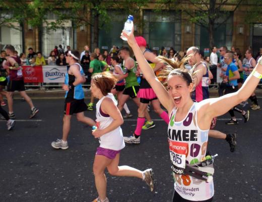 Our supporter Aimee rejoices as she takes part in the Virgin London Marathon