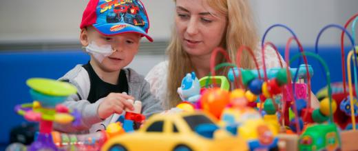 Little boy with toys