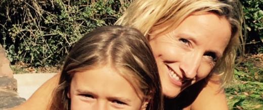 Chloe hugging her daughter