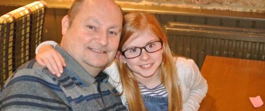 Phil with his granddaughter