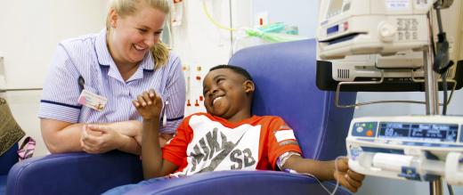 Play specialist India Nelson with a patient