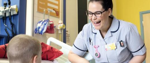 Staff Nurse Nadia Freri with a young patient