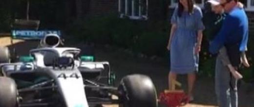 Harry and his parents with F1 car